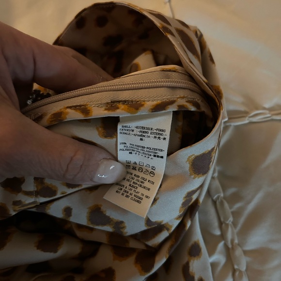 13. Free People Normani Bias
Leopard Print Satin Midi
Skirt
Size: 2 - Picture 4 of 6